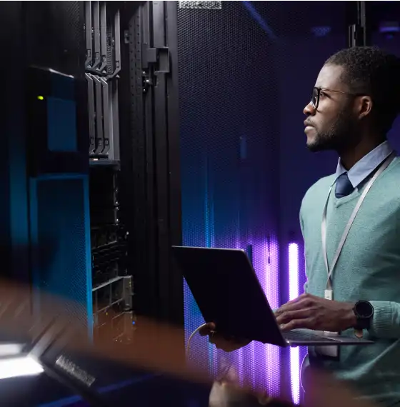 A man holding a laptop